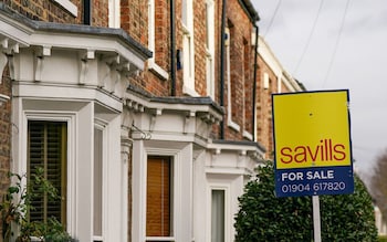 How a messy neighbour could knock £56,000 off your house price