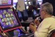 Opponents of smoking in casinos try to enlist shareholders of gambling companies in non-smoking push