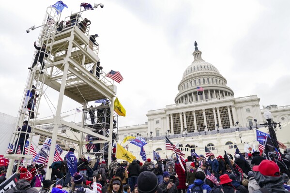 Man who attacked police after storming US Capitol with Confederate flag gets over 2 years in prison