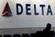 An emergency slide falls off a Delta Air Lines plane, forcing pilots to return to JFK in New York