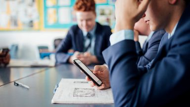 Schools which ban mobile phones get better GCSE grades, study finds