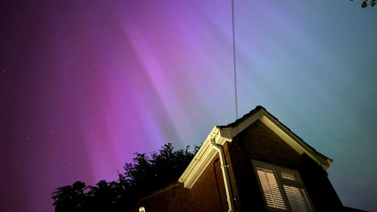 Northern Lights glow up skies across UK and around the world - see best pictures here