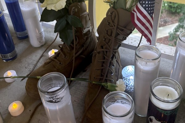 Questions and grief linger at the apartment door where a deputy killed a US airman