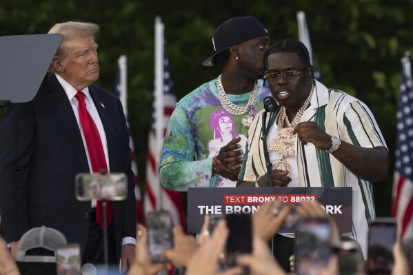 Trump appeared on stage at his Bronx rally with two rappers charged in a felony gang case