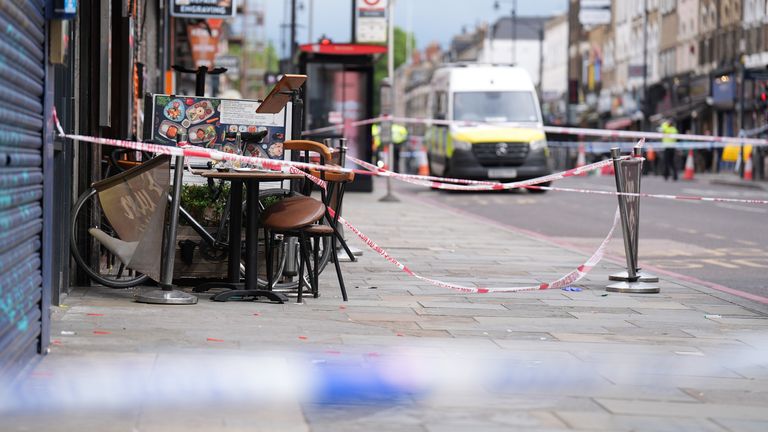 Hackney shooting: Girl, 9, 'fighting for her life' after attack at east London restaurant