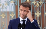 Blow to Macron as French credit rating downgraded