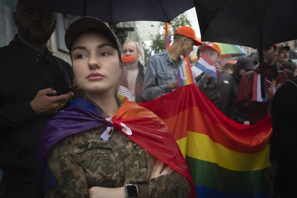 LGBTQ soldiers in Ukraine hope their service is changing attitudes as they rally for legal rights