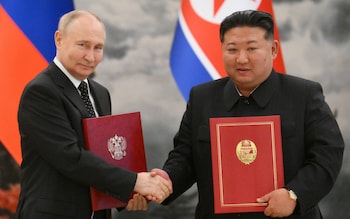 Putin signs pact with Kim Jong-un in Soviet-style meeting of dictators