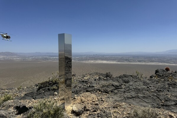 Shiny monolith removed from mountains outside Las Vegas. How it got there still is a mystery