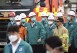 South Korean rescuers search burned factory after a blaze killed 22, mostly Chinese migrants