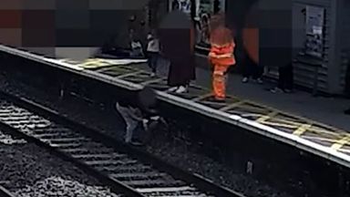 LNER releases footage showing moment child was rescued from rail track seconds before train passed through