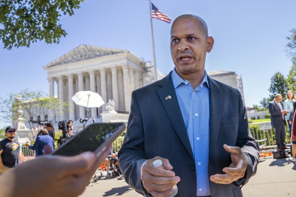 Officers who defended the Capitol fight falsehoods about Jan. 6 and campaign for Joe Biden