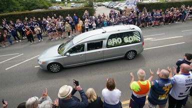 Rob Burrow funeral takes place as hundreds of fans line route with some wearing Leeds Rhinos shirts