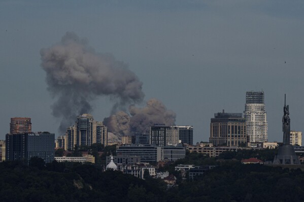 Russian missiles hit a children’s hospital in the Ukrainian capital and kill at least 10 elsewhere