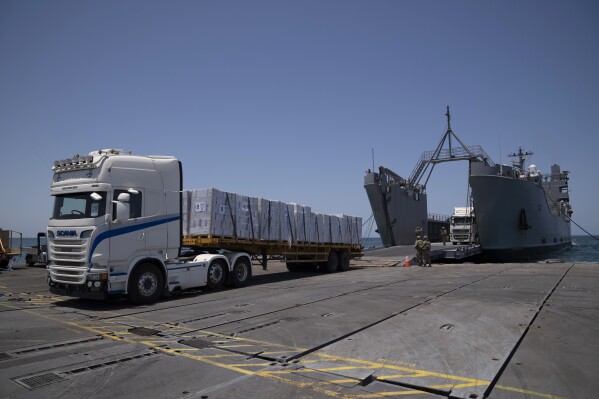 US-built pier will be put back in Gaza for several days to move aid, then permanently removed