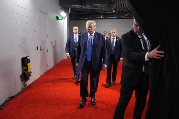 The stepped-up security around Trump is apparent, with agents walling him off from RNC crowds