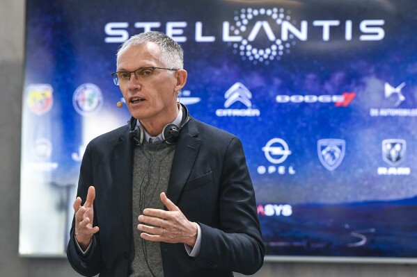 Carmaker Stellantis pledges to tackle problems in North America as profits plunge