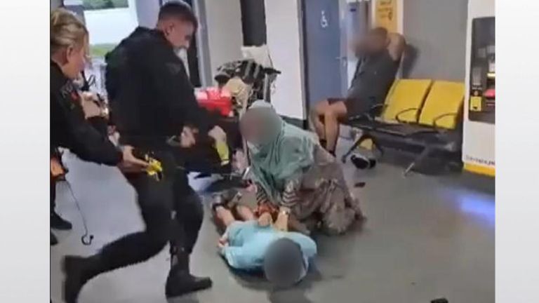 Police officer kicks and stamps on man's head at Manchester Airport