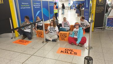 Just Stop Oil activists block departure gates at Gatwick airport