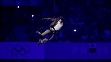 Paris Olympics closes with dystopian ceremony - as Tom Cruise abseils into stadium and Billie Eilish performs new hit