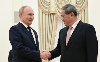 Putin celebrates deepening ties with Beijing as Chinese premier visits