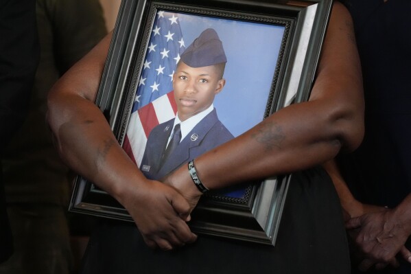 Authorities arrest ex-sheriff’s deputy who fatally shot a Black airman at his home