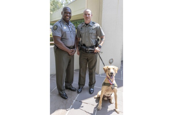 Mississippi wildlife officer and K-9 receive medal for finding 3 missing children