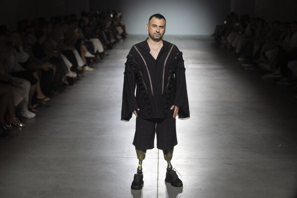 Wearing prosthetics, Ukraine war veterans take to the runway as fashion week returns