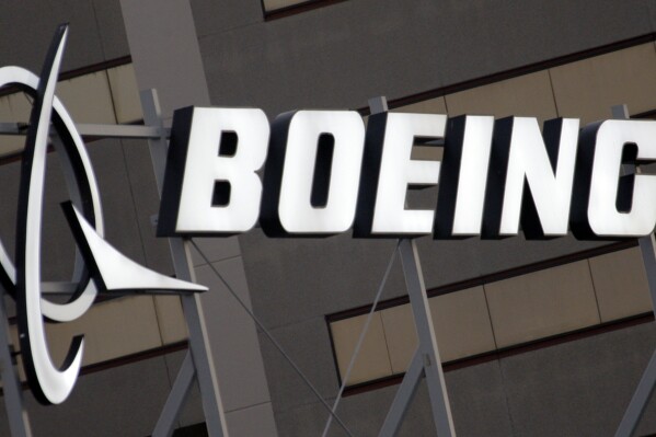 Boeing says it has a deal to avoid a strike by more than 30,000 machinists