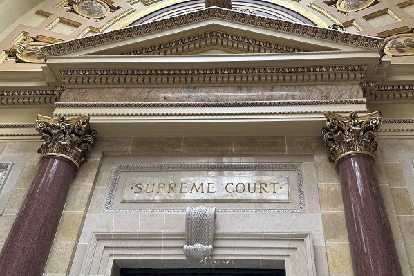 Wisconsin Supreme Court weighs activist’s attempt to make ineligible voter names public