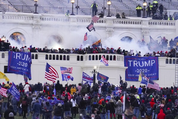 First rioters to breach a police perimeter during Capitol siege are sentenced to prison terms