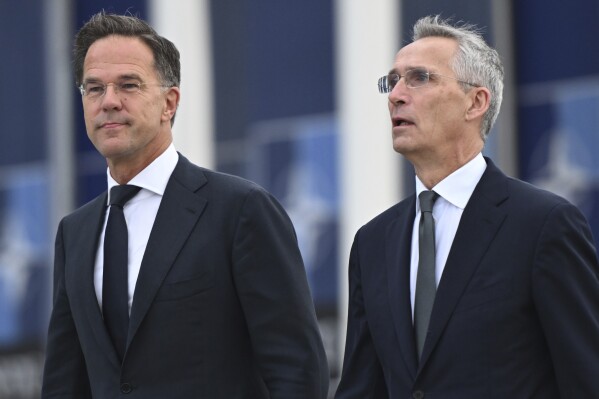 NATO’s longtime chief hands over to former Dutch premier Mark Rutte